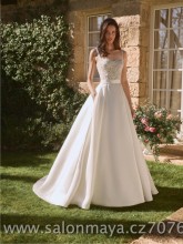 Svatební šaty 2v1 v barvě ivory, krátké krajkové šaty na ramínka přes které se připne sukně z materiálu mikádo, kapsy. 