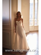 Elegantní, korzetové, saténové šaty áčkového střihu. Přední část sukně je možné stáhnout a udělat z nich atraktivnějsí šaty vpředu krátké, které jdou do vlečky. 